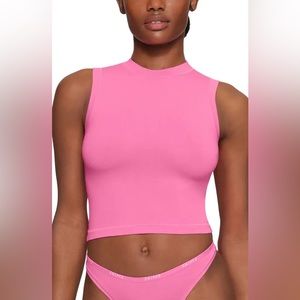 Pink mock neck tank skims